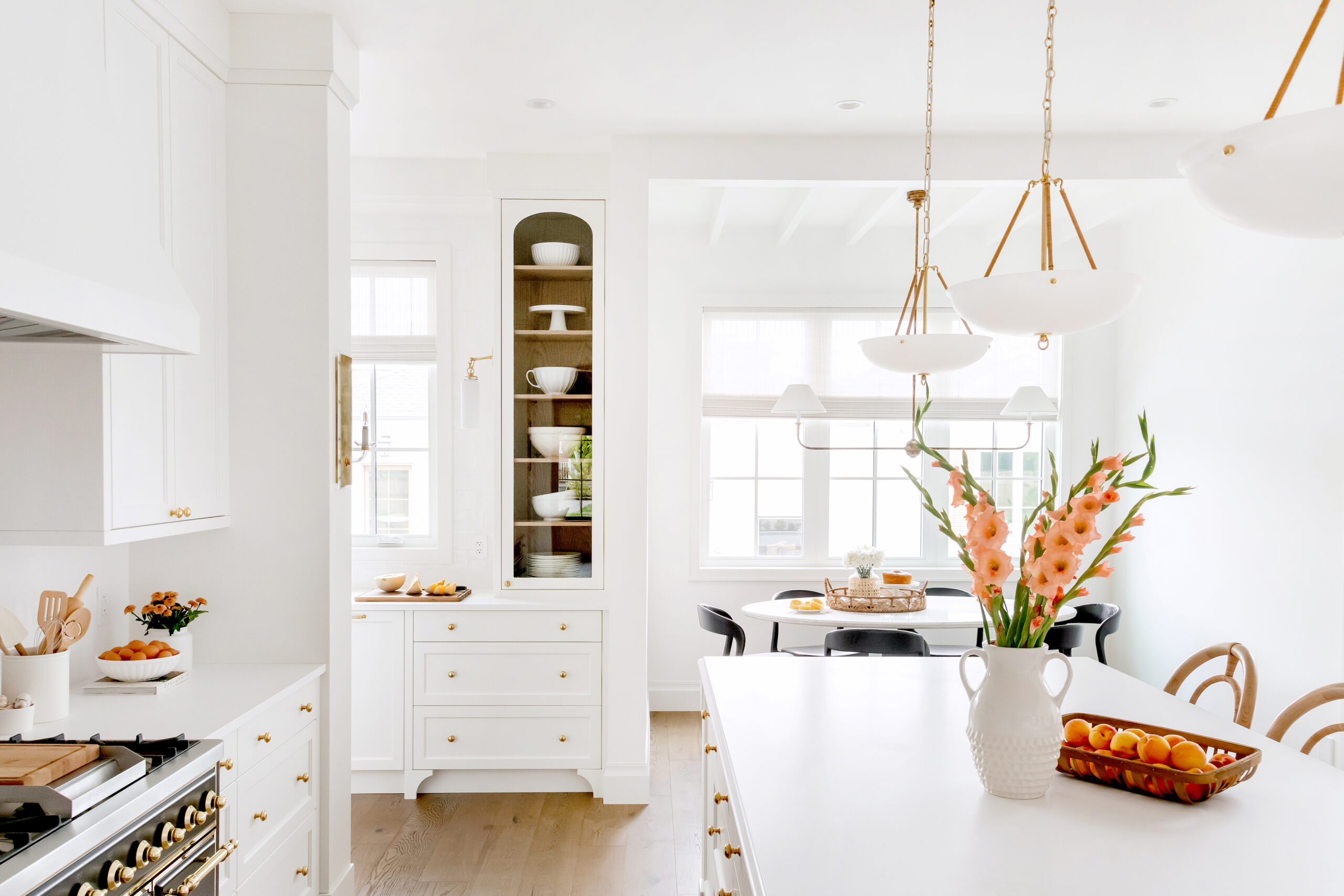 white kitchen with wood floors